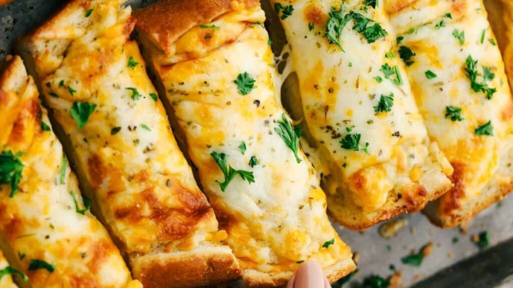 Try our freshly-baked garlic bread, loaded with buttery, garlicky goodness and melted cheese - it's to die for!